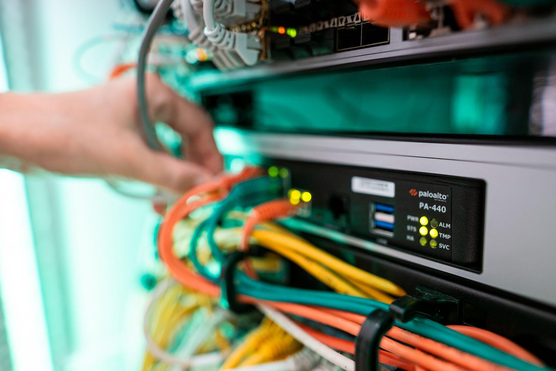 ALTEPRO technician working on network infrastructure